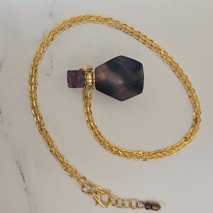 Elegant Gold Necklace with Purple Pendant
